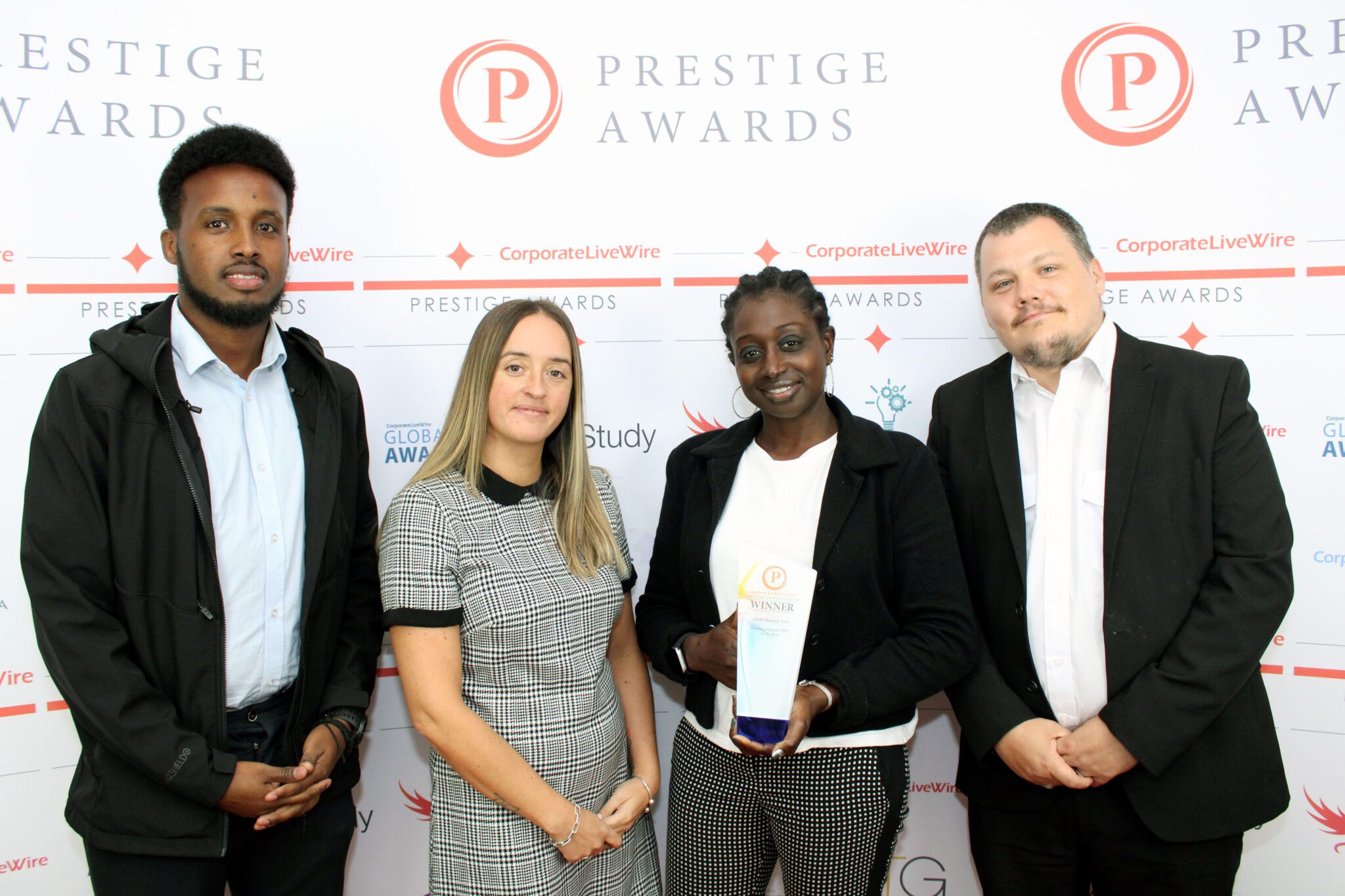 Albany Housing Trust staff receiving a housing support award
